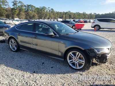 Czwarte zdjęcie samochodu z boku: 2014 AUDI A7 PRESTIGE VIN:WAU2GAFC0EN069760 - miniatura