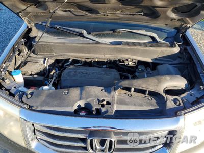 Zdjęcie 12 z 13 samochodu: 2012 HONDA PILOT EXL VIN:5FNYF3H57CB032324 - miniatura