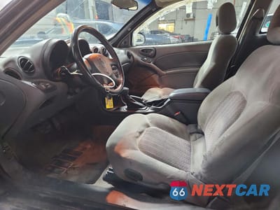 Zdjęcie 7 z 13 samochodu: 2004 PONTIAC GRAND AM GT VIN:1G2NW12E74C155625 - miniatura
