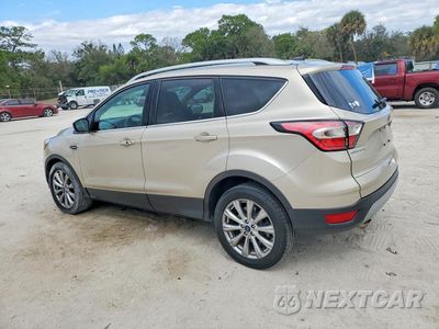 Drugie zdjęcie samochodu z przodu: 2017 FORD ESCAPE TITANIUM VIN:1FMCU0J94HUE21055 - miniatura