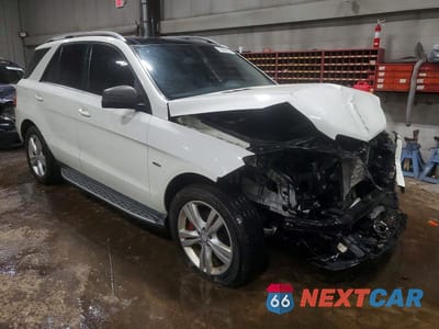 Czwarte zdjęcie samochodu z boku: 2012 MERCEDES-BENZ ML 350 BLUETEC VIN:4JGDA2EB2CA001035 - miniatura
