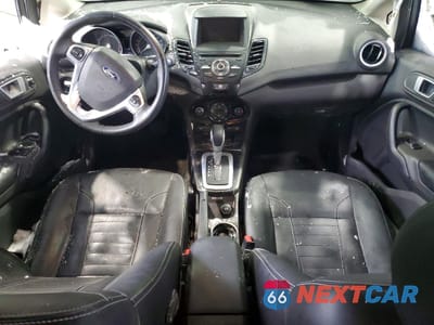 Zdjęcie 8 z 14 samochodu: 2014 FORD FIESTA TITANIUM VIN:3FADP4FJ4EM163085 - miniatura