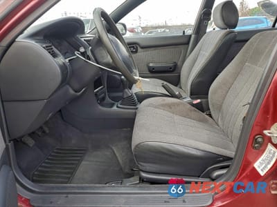 Zdjęcie 7 z 14 samochodu: 1993 TOYOTA COROLLA VIN:1NXAE04E9PZ054245 - miniatura