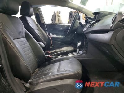 Zdjęcie 7 z 14 samochodu: 2014 FORD FIESTA TITANIUM VIN:3FADP4FJ4EM163085 - miniatura