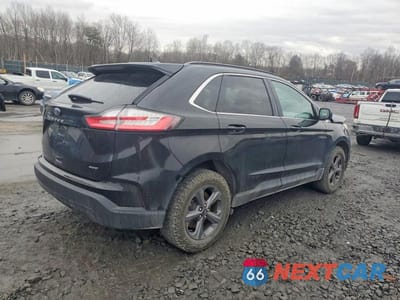 Trzecie zdjęcie samochodu z tyłu: 2022 FORD EDGE SEL VIN:2FMPK4J97NBB11207 - miniatura