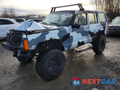 1987 JEEP CHEROKEE LAREDO 1JCML7843HT135622 - główne zdjęcie licytacji z USA - miniatura