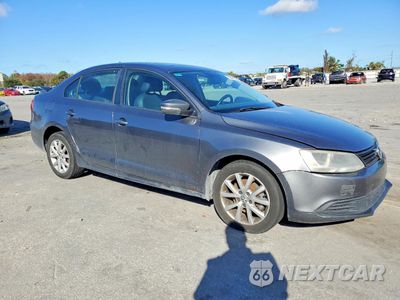 Czwarte zdjęcie samochodu z boku: 2012 VOLKSWAGEN JETTA SE VIN:3VWDX7AJ8CM303104 - miniatura