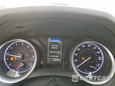 Zdjęcie 9 z 13 samochodu: 2021 TOYOTA CAMRY LE VIN:4T1C11AKXMU594817 - miniatura