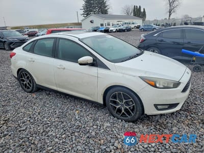 Czwarte zdjęcie samochodu z boku: 2017 FORD FOCUS SEL VIN:1FADP3H26HL249004 - miniatura