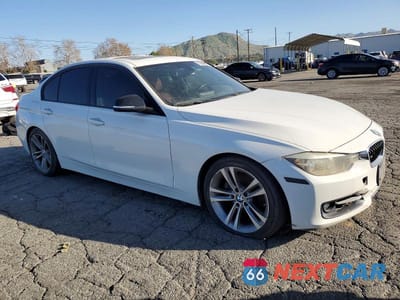 Czwarte zdjęcie samochodu z boku: 2012 BMW 328 I SULEV VIN:WBA3C1C54CF433921 - miniatura