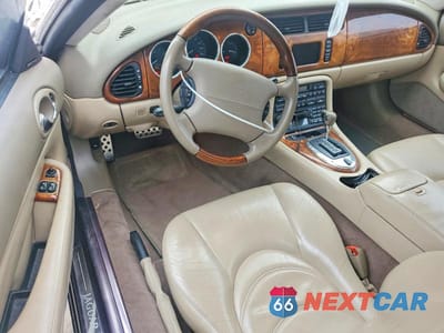 Zdjęcie 8 z 11 samochodu: 2004 JAGUAR XKR VIN:SAJDA42B243A37483 - miniatura