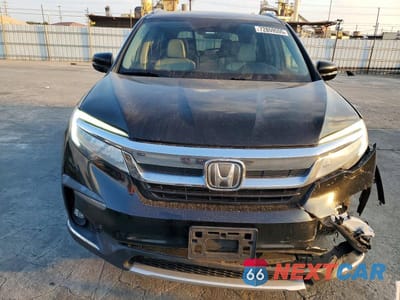Piąte zdjęcie samochodu w środku: 2019 HONDA PILOT VIN:5FNYF5H91KB004662 - miniatura