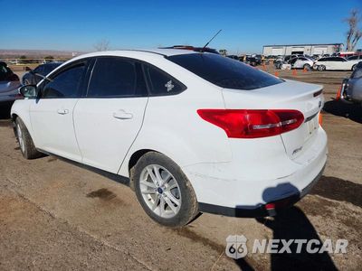 Drugie zdjęcie samochodu z przodu: 2017 FORD FOCUS VIN:1FADP3F20HL320152 - miniatura