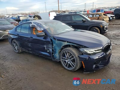 Czwarte zdjęcie samochodu z boku: 2023 BMW M5 VIN:WBS83CH04PCN22583 - miniatura