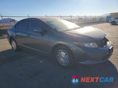 Czwarte zdjęcie samochodu z boku: 2012 HONDA CIVIC HF VIN:2HGFB2F64CH525253 - miniatura