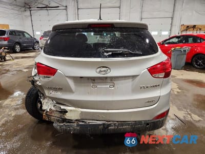 Zdjęcie 6 z 12 samochodu: 2010 HYUNDAI TUCSON VIN:KM8JUCAC8AU047186 - miniatura