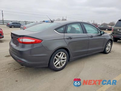 Trzecie zdjęcie samochodu z tyłu: 2016 FORD FUSION SE VIN:3FA6P0H77GR119381 - miniatura