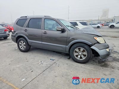 Czwarte zdjęcie samochodu z boku: 2009 KIA BORREGO LX VIN:KNDJJ741895028450 - miniatura