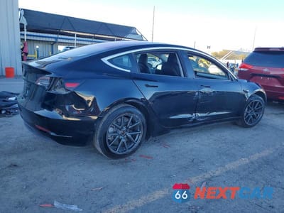 Trzecie zdjęcie samochodu z tyłu: 2018 TESLA MODEL 3 VIN:5YJ3E1EA7JF016088 - miniatura