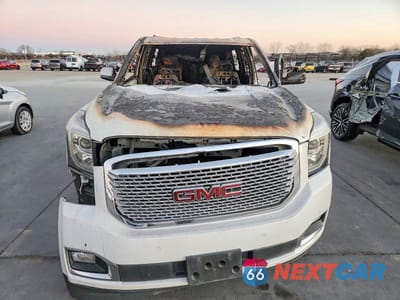 Piąte zdjęcie samochodu w środku: 2016 GMC YUKON DENALI VIN:1GKS2CKJ6GR438073 - miniatura