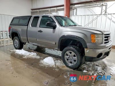 Czwarte zdjęcie samochodu z boku: 2013 GMC SIERRA K1500 SLE VIN:1GTR2VE70DZ375232 - miniatura