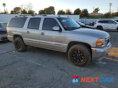 Czwarte zdjęcie samochodu z boku: 2005 GMC YUKON XL K1500 VIN:3GKFK16Z75G118909 - miniatura