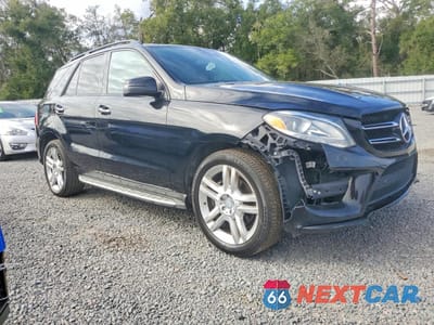 Czwarte zdjęcie samochodu z boku: 2017 MERCEDES-BENZ GLE 350 VIN:4JGDA5JB7HA872219 - miniatura