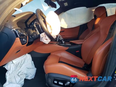 Zdjęcie 7 z 12 samochodu: 2022 BMW M5 VIN:WBS83CH09NCK02348 - miniatura