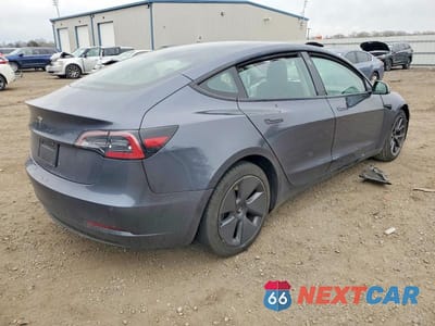 Trzecie zdjęcie samochodu z tyłu: 2021 TESLA MODEL 3 VIN:5YJ3E1EA6MF064301 - miniatura