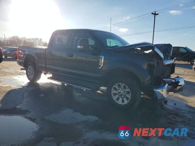 Czwarte zdjęcie samochodu z boku: 2022 FORD F350 SUPER DUTY VIN:1FT8W3AN5NED05534 - miniatura