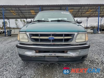 Piąte zdjęcie samochodu w środku: 1997 FORD F150 VIN:1FTDF1720VKD11808 - miniatura