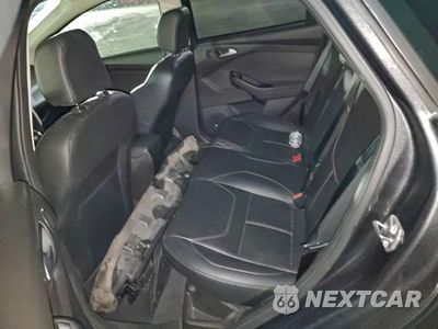Zdjęcie 10 z 14 samochodu: 2016 FORD FOCUS TITANIUM VIN:1FADP3N2XGL374784 - miniatura