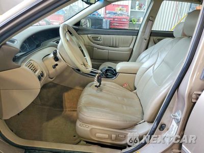 Zdjęcie 7 z 12 samochodu: 2001 TOYOTA AVALON XL VIN:4T1BF28B51U153665 - miniatura