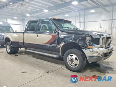 Czwarte zdjęcie samochodu z boku: 2000 FORD F350 SUPER DUTY VIN:1FTWW33F4YED11343 - miniatura