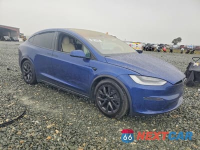 Czwarte zdjęcie samochodu z boku: 2022 TESLA MODEL X VIN:7SAXCDE5XNF336736 - miniatura