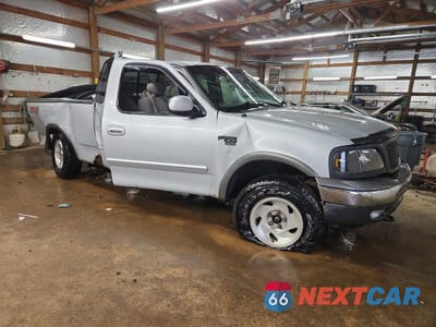 Czwarte zdjęcie samochodu z boku: 2003 FORD F150 VIN:2FTRX18L93CA15858 - miniatura