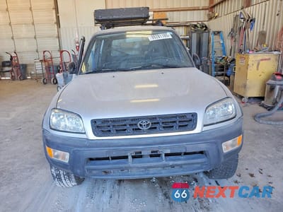 Piąte zdjęcie samochodu w środku: 1998 TOYOTA RAV4 VIN:JT3GP10VXW7034544 - miniatura