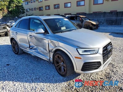 Czwarte zdjęcie samochodu z boku: 2018 AUDI Q3 PREMIUM PLUS VIN:WA1JCCFS1JR018732 - miniatura