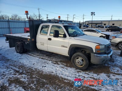 Czwarte zdjęcie samochodu z boku: 2006 GMC SIERRA FLATBED TRUCK VIN:1GTJK39D76E230572 - miniatura