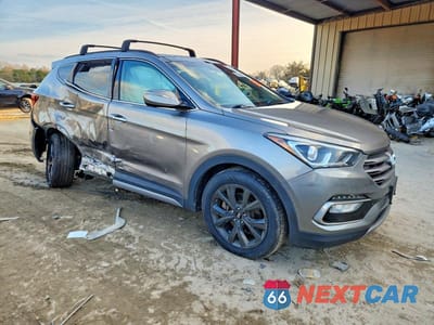 Czwarte zdjęcie samochodu z boku: 2017 HYUNDAI SANTA FE SPORT 2.0T ULTIMATE VIN:5XYZWDLA6HG401673 - miniatura