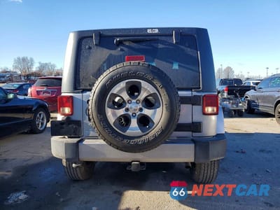 Zdjęcie 6 z 14 samochodu: 2016 JEEP WRANGLER SAHARA VIN:1C4AJWBG0GL307823 - miniatura