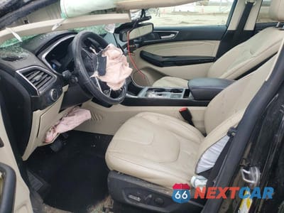 Zdjęcie 7 z 14 samochodu: 2021 FORD EDGE TITANIUM VIN:2FMPK4K92MBA27180 - miniatura