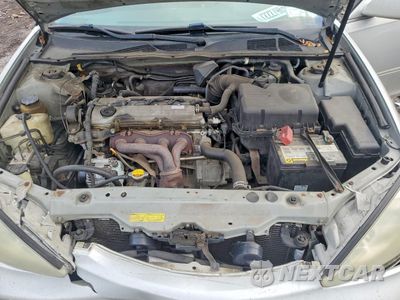 Zdjęcie 11 z 13 samochodu: 2003 TOYOTA CAMRY LE VIN:4T1BE30K13U727878 - miniatura