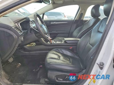 Zdjęcie 7 z 11 samochodu: 2019 FORD FUSION TITANIUM VIN:3FA6P0K92KR270910 - miniatura