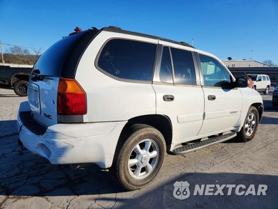 Trzecie zdjęcie samochodu z tyłu: 2004 GMC ENVOY VIN:1GKDS13S842370027 - miniatura