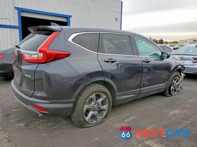 Trzecie zdjęcie samochodu z tyłu: 2018 HONDA CR-V EX VIN:2HKRW2H51JH622919 - miniatura