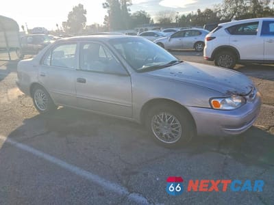 Czwarte zdjęcie samochodu z boku: 2000 TOYOTA COROLLA VE VIN:1NXBR12E7YZ405172 - miniatura