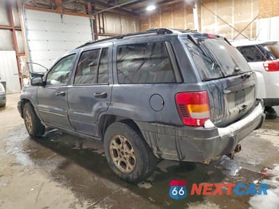 Drugie zdjęcie samochodu z przodu: 2003 JEEP GRAND CHEROKEE LAREDO VIN:1J8GW48S83C512384 - miniatura