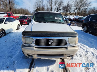 Piąte zdjęcie samochodu w środku: 2000 MERCURY MOUNTAINEER VIN:4M2ZU86PXYUJ00720 - miniatura