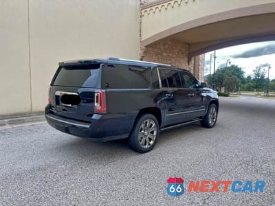 Czwarte zdjęcie samochodu z boku: 2016 GMC YUKON XL DENALI VIN:1GKS2HKJ3GR301508 - miniatura